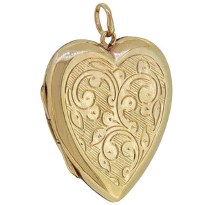 A modern, 9ct yellow gold, heart shaped locket.