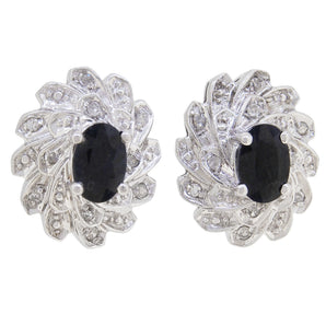 A pair of modern, 9ct white gold, sapphire & diamond set stud earrings.