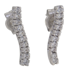 A pair of modern, 18ct white gold, diamond set, in line, wave stud earrings.