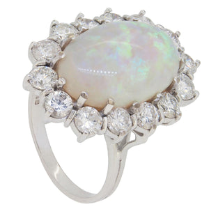 A modern, 18ct white gold, opal & diamond set cluster ring.