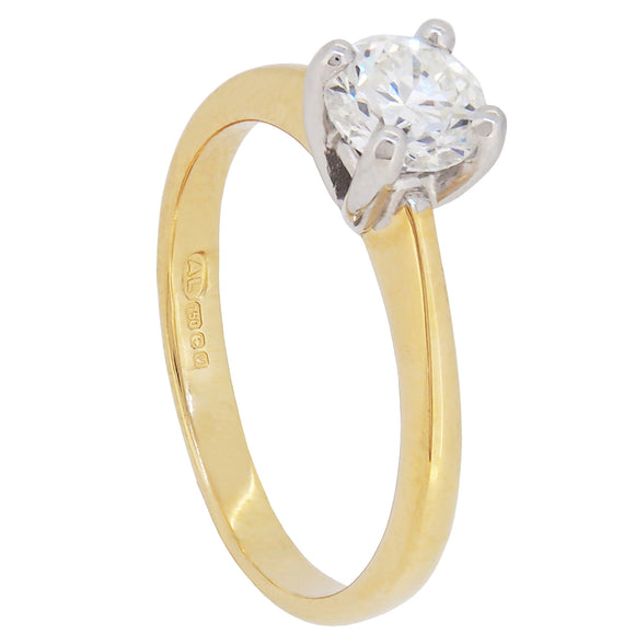 An 18ct yellow gold, diamond set, single stone, solitaire ring