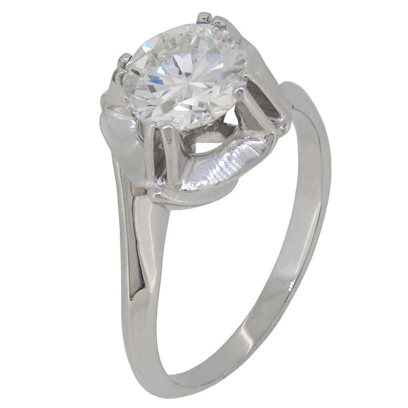 A mid-20th century, platinum, diamond set, single stone ring with a petal mount