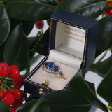 An early 20th century, 18ct gold, sapphire & diamond set triple cluster ring.