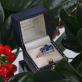 An early 20th century, 18ct gold, sapphire & diamond set triple cluster ring.