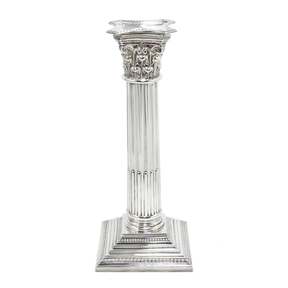 A modern, silver, Corinthian candlestick