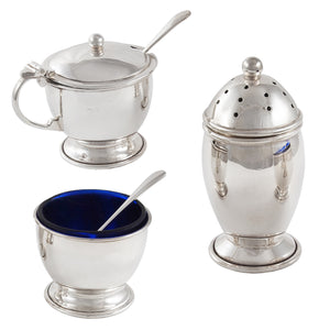 A modern, silver, three piece cruet.