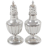 A pair of Edwardian, silver pepper pots