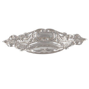 A modern, silver, oval bon bon dish