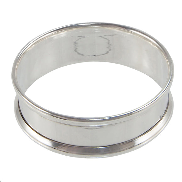 A silver, plain napkin ring