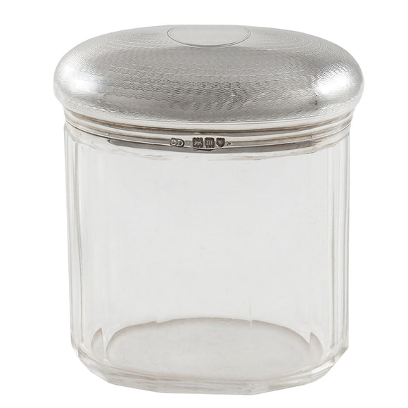 An Edwardian, glass jar with a silver lid