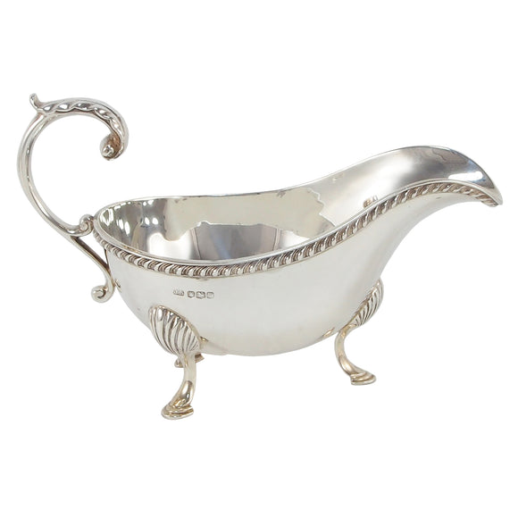 An early 20th century, silver gravy boat
