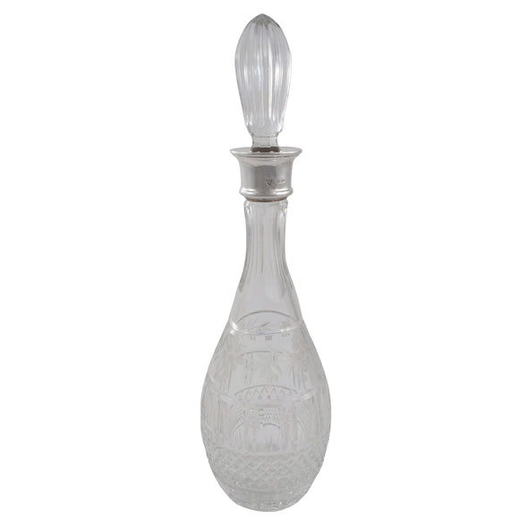 A modern, glass decanter with a grape & vine motif, silver mount & glass stopper