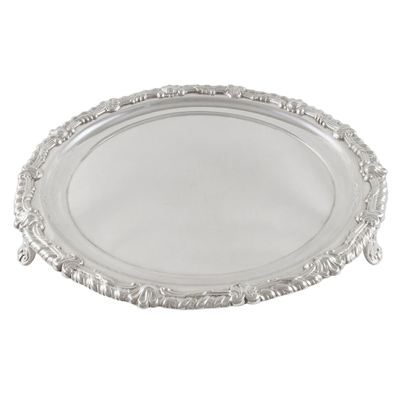 A Georgian, silver, circular salver on three feet