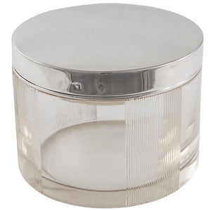 An early 20th century glass jar with a silver lid & insert