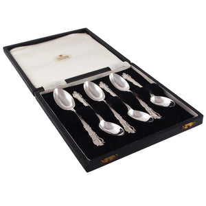 Six early 20th century, silver coffee spoons & fitted case