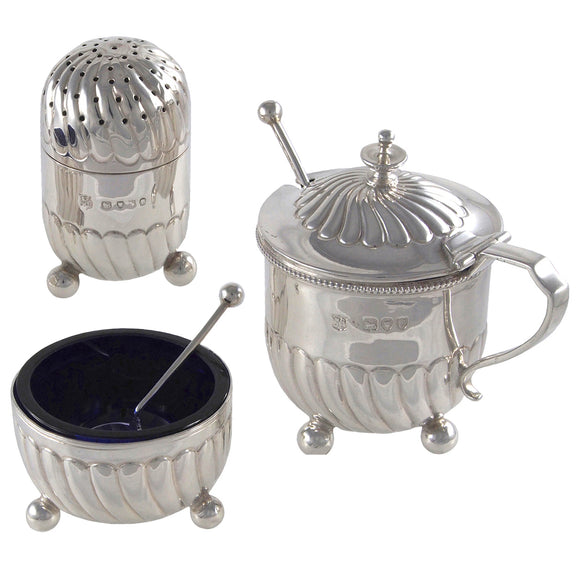 A Victorian, silver, three piece cruet