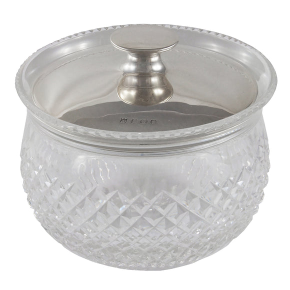 An early 20th century, glass dish with a silver lid
