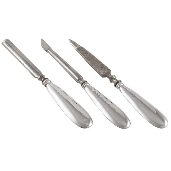 A set of three early 20th century, silver handled manicure items