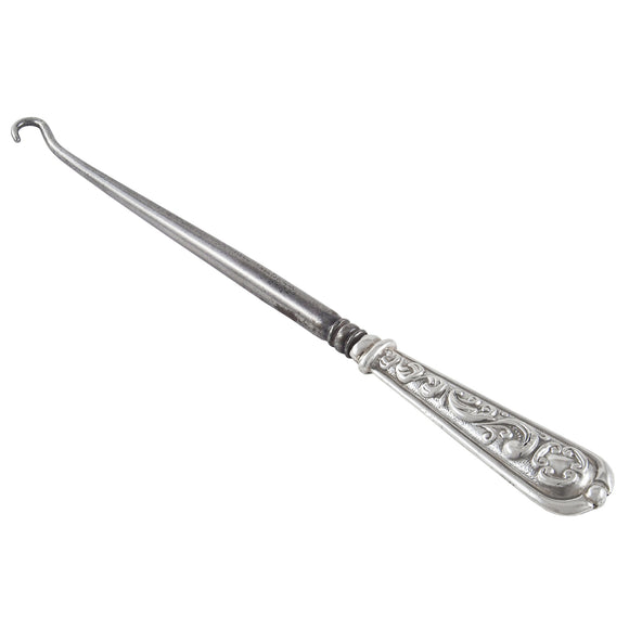 An Edwardian, silver handled button hook