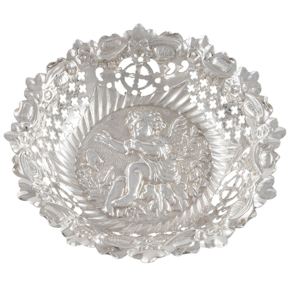 A Victorian, silver, pierced, circular bon bon dish with the image of a cherub in the bottom of the bowl
