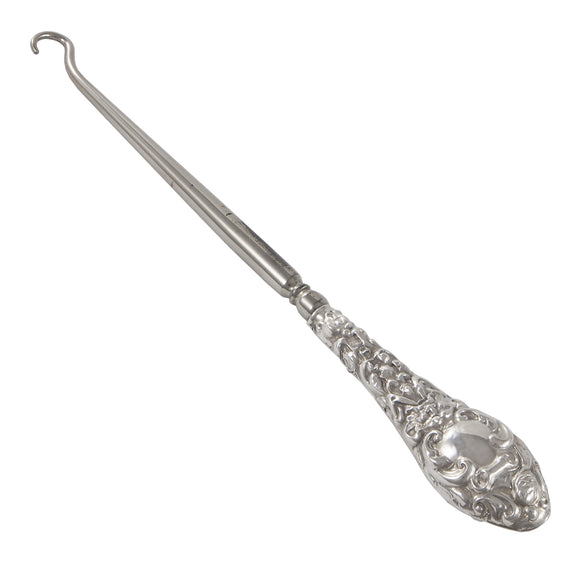 An Edwardian, silver button hook