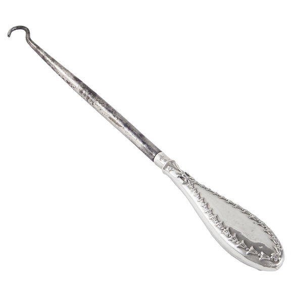 An Edwardian, silver handled button hook