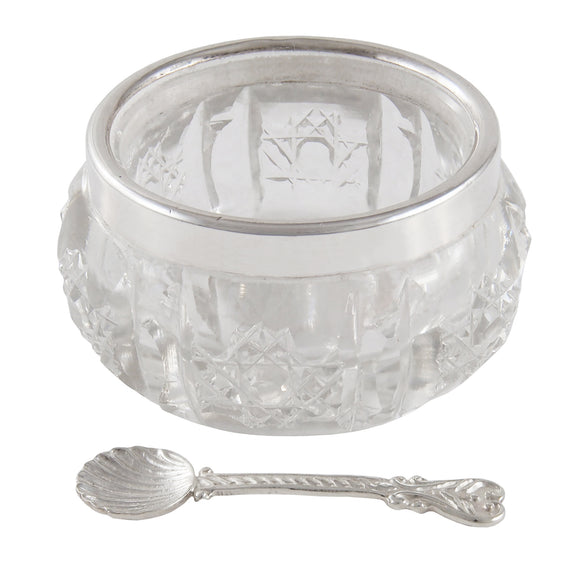An early 20th century, glass, open salt with a silver rim & silver spoon