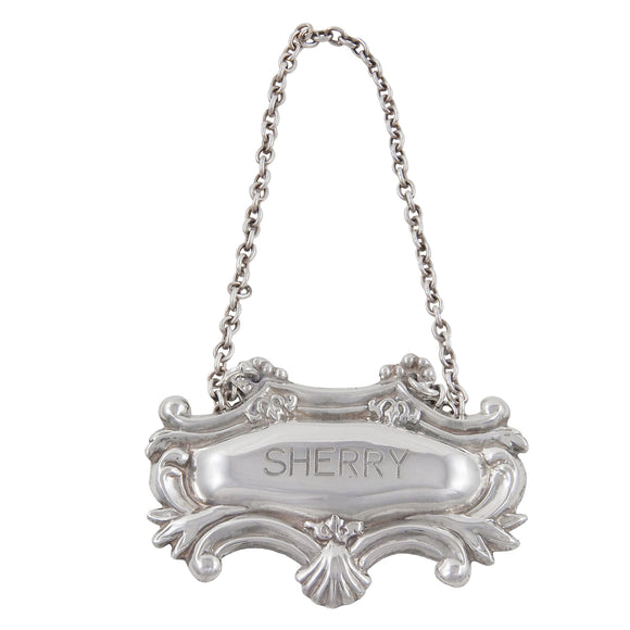 A modern, silver, sherry decanter label