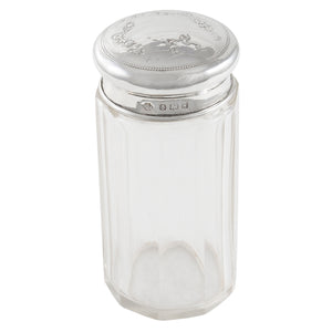 An Edwardian, glass jar with a silver lid