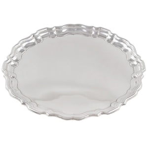 A modern, silver, circular card tray