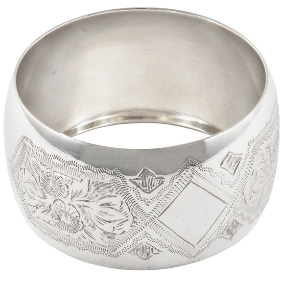 An Edwardian, silver, barrel shaped napkin ring