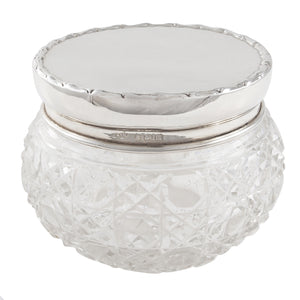 An Edwardian, glass jar with a silver lid