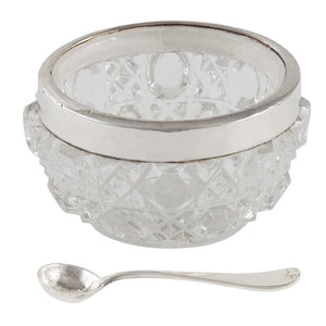 An Edwardian, cut glass open salt with a silver rim & spoon