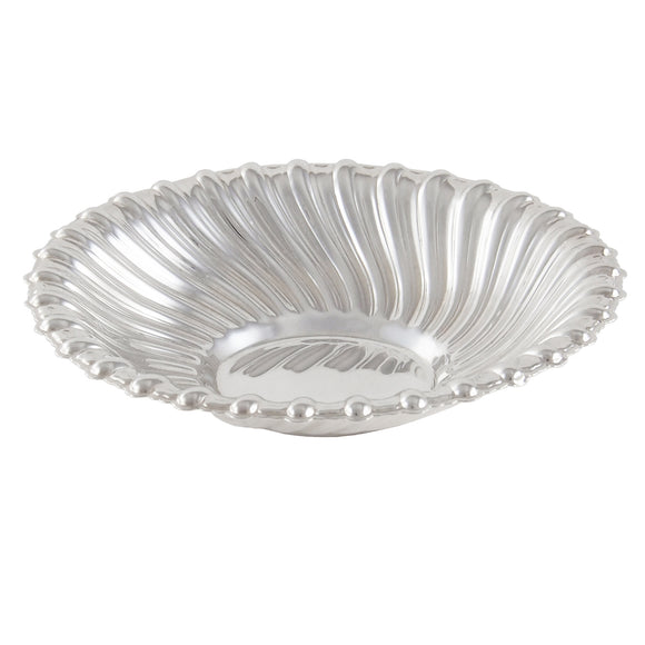 A modern, silver, circular dish