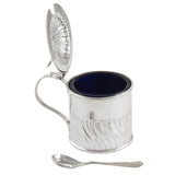 An Edwardian, silver, drum mustard pot & spoon & a blue glass liner