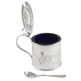 An Edwardian, silver, drum mustard pot & spoon & a blue glass liner.