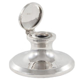 An early 20th century, silver capstan inkwell with a clear glass liner