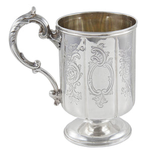 A Victorian, silver, child's engraved mug with a gilt interior.