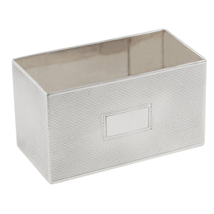 An early 20th century, silver, rectangular, engine turned napkin ring