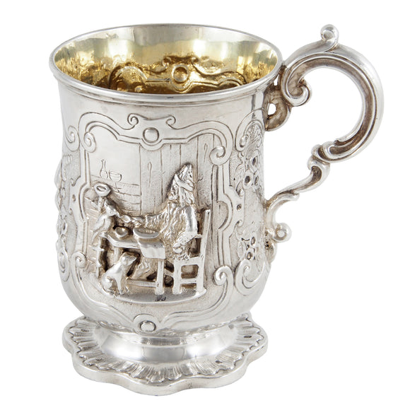 A Victorian, silver tankard with a figure in relief of a person & fruit