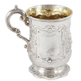 A Victorian, silver tankard with a figure in relief of a person & fruit