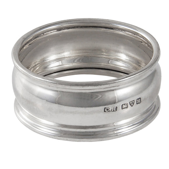An Edwardian, silver, plain, barrel shaped napkin ring