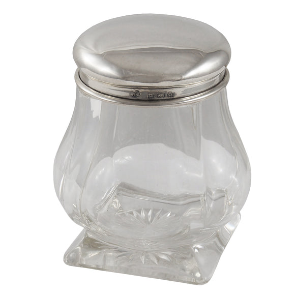 An Edwardian, glass jar with a silver lid