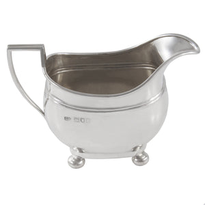 An Edwardian, silver cream jug
