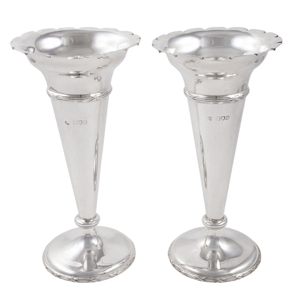 A pair of Edwardian, silver vases