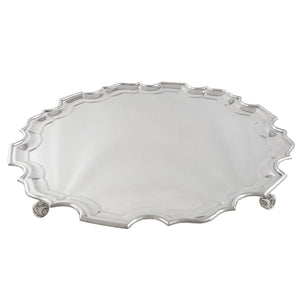 An Edwardian, silver, circular salver on four feet