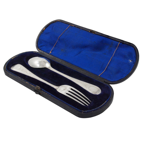 A Victorian, silver, child's fork & spoon & fitted case