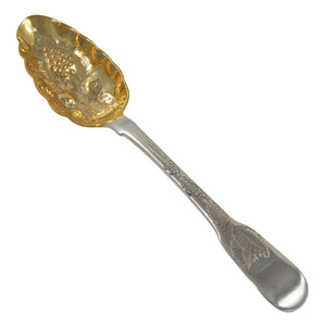 A Georgian, silver berry spoon with a gilded bowl