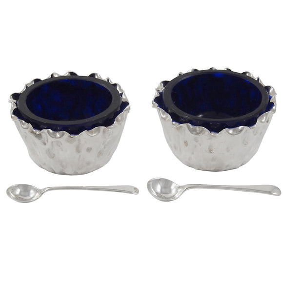 A pair of Victorian, silver open salts with blue glass liners & spoons