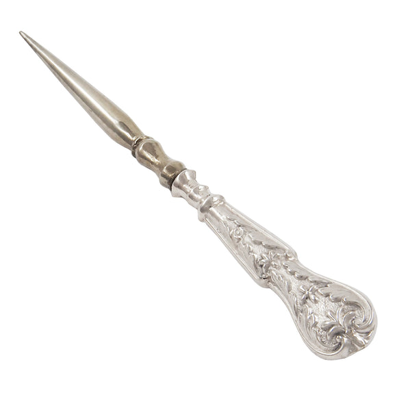 A Victorian, white metal bodkin with an embossed handle